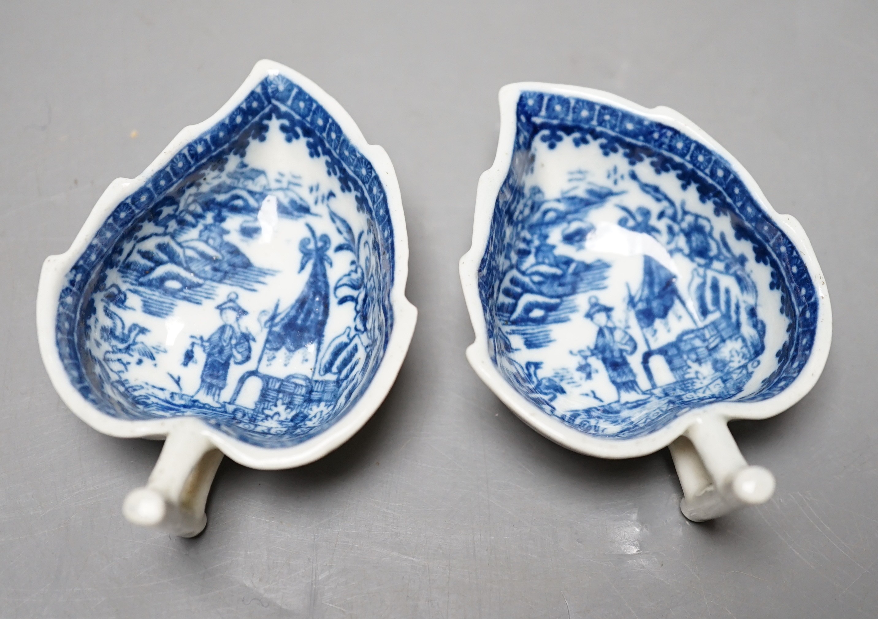 Two Caughley fisherman pattern blue and white pickle leaf dishes, c.1780, one with S mark, 7.5 cm long